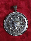 Bijou ancien circulaire filigrané