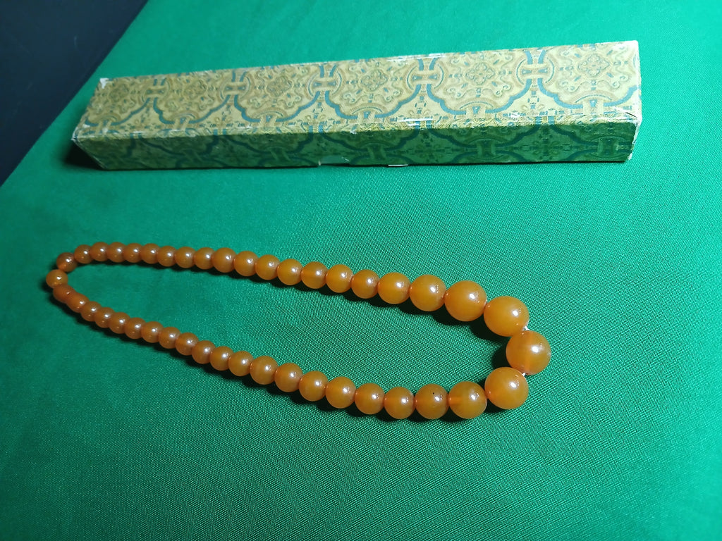 Collier en bakélite de couleur orange 1950