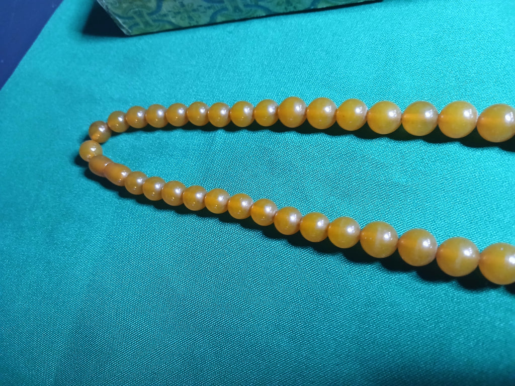 Collier en bakélite de couleur orange 1950