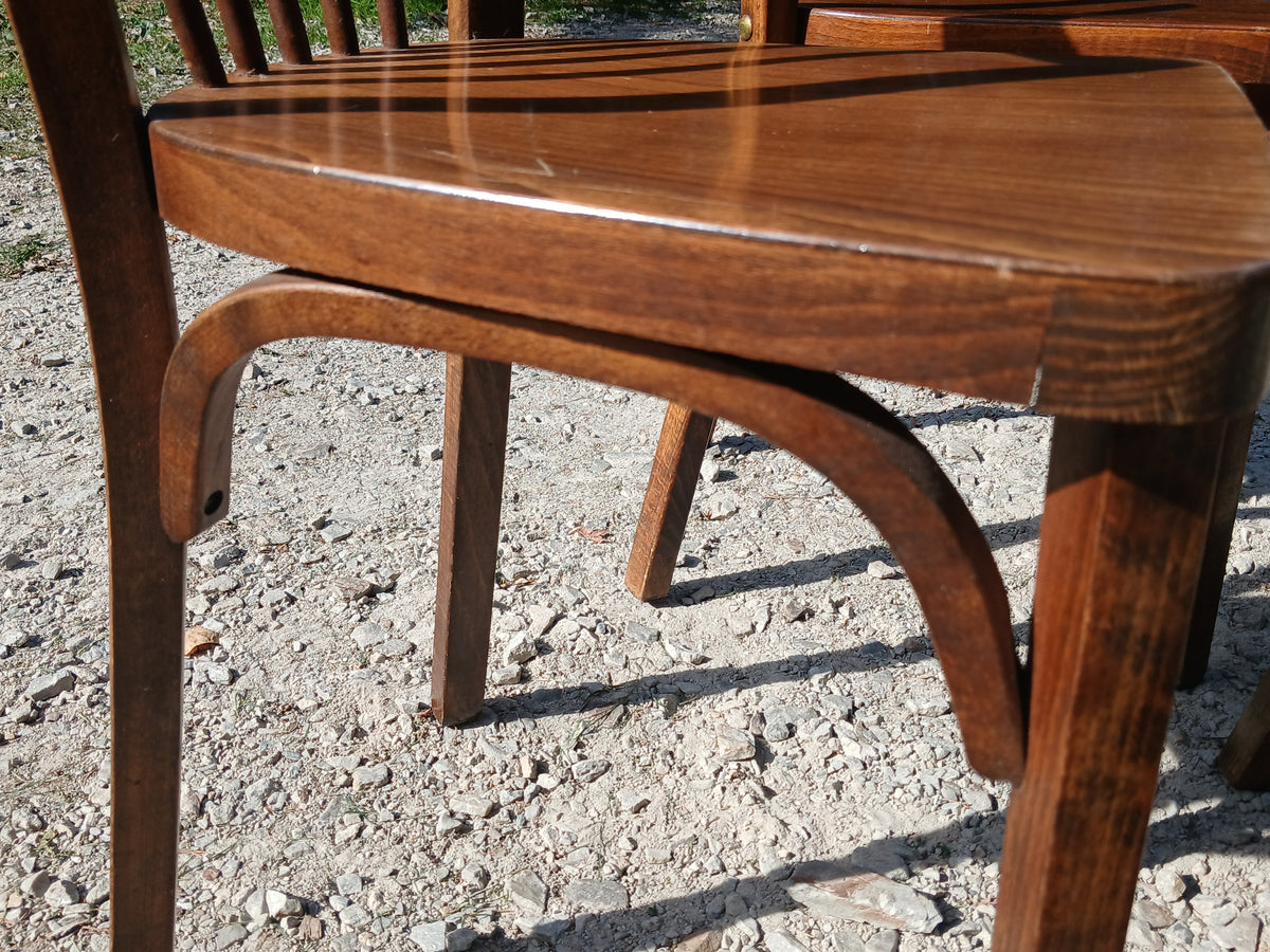 quatre chaises de bistrot Baumann en bois massif  1950